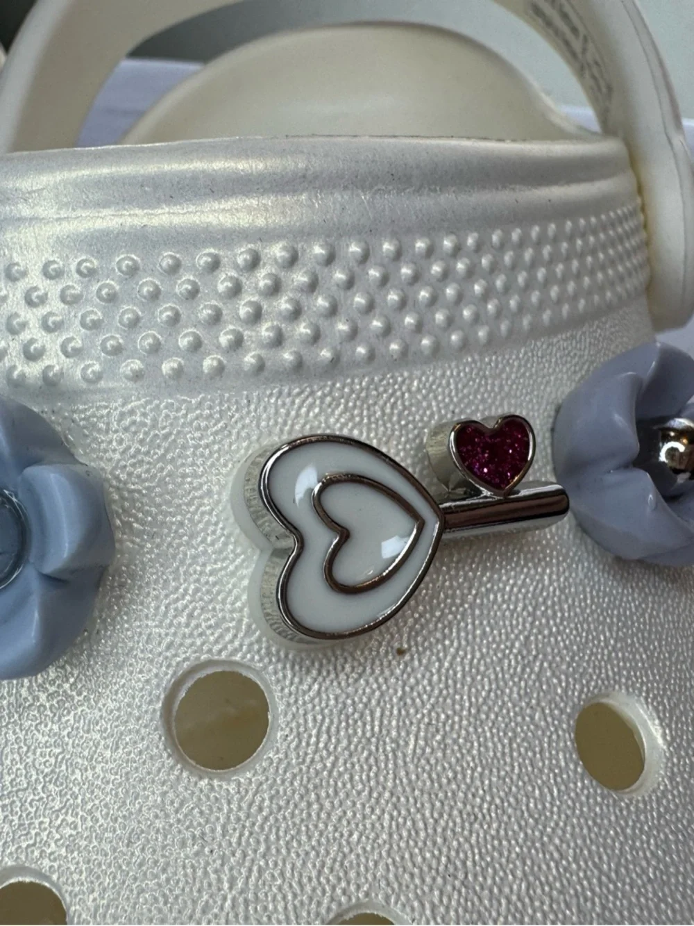 CROCS Kids Classic Iridescent Clogs in Pearl White with Heart & Flower Charms